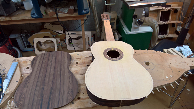 Traditionally built falcate braced classical guitar. Classical